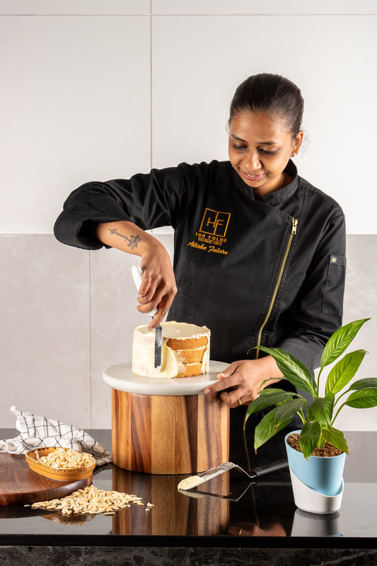 Professional chef working in a commercial bakery kitchen, representing a skill-based career path for career switchers